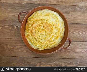 cheese timbale - French cuisine.casserole of pasta macaroni with cream sauce and cheese