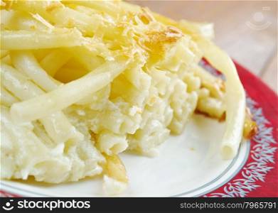 cheese timbale - French cuisine.casserole of pasta macaroni with cream sauce and cheese