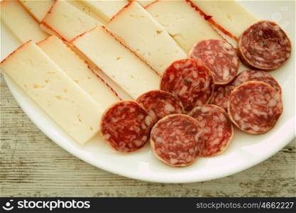Cheese tray party and sausage. Cold appetizer