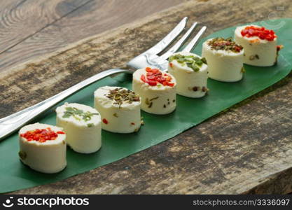 cheese with spices on wooden background