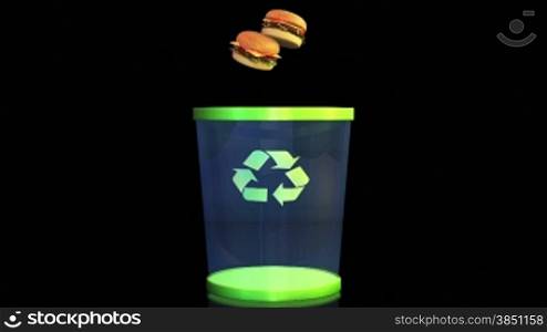 Cheeseburgers falling in a Garbage Bin against black, Dieting Concept, Alpha