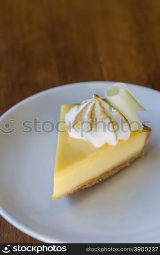 cheesecake . Slice of new york style cheesecake on the plate