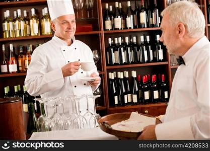Chef cook drink coffee waiter serve on tray in restaurant