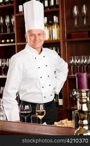 Chef cook wine bar professional standing confident in restaurant
