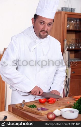 chef cutting vegetables