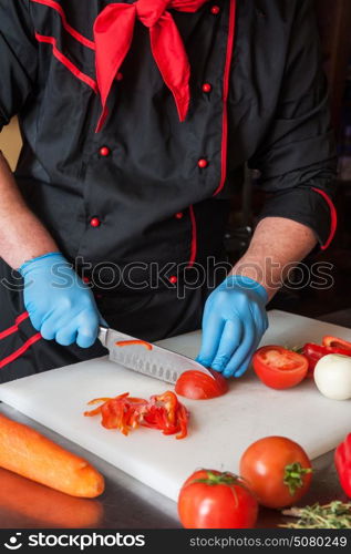 Chef cutting vegetables. Chef cutting vegetables with knife