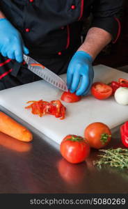 Chef cutting vegetables. Chef cutting vegetables with knife