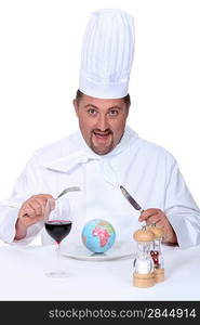 Chef eating planet earth