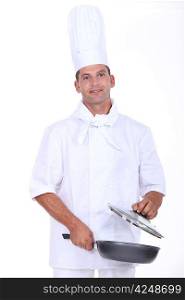 chef holding a pan