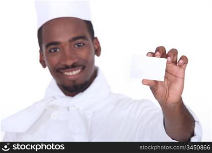 Chef holding business card
