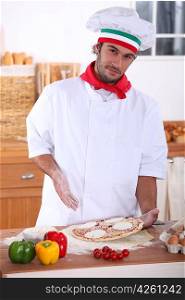 Chef making pizza