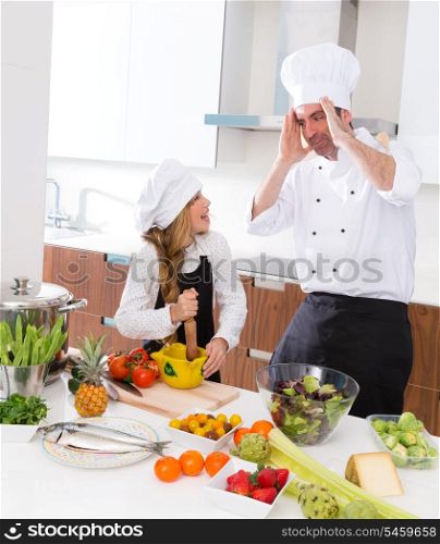 Chef master and junior kid girl at cooking school crazy man about pupil recipe