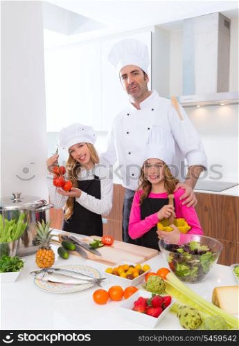 Chef master and junior pupil kid girls at cooking school with food on countertop
