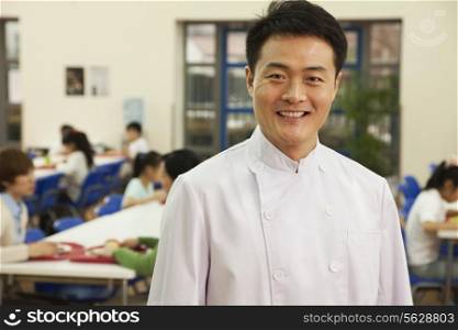 Chef portrait in school cafeteria