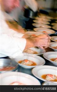 Chef Preparing Plates