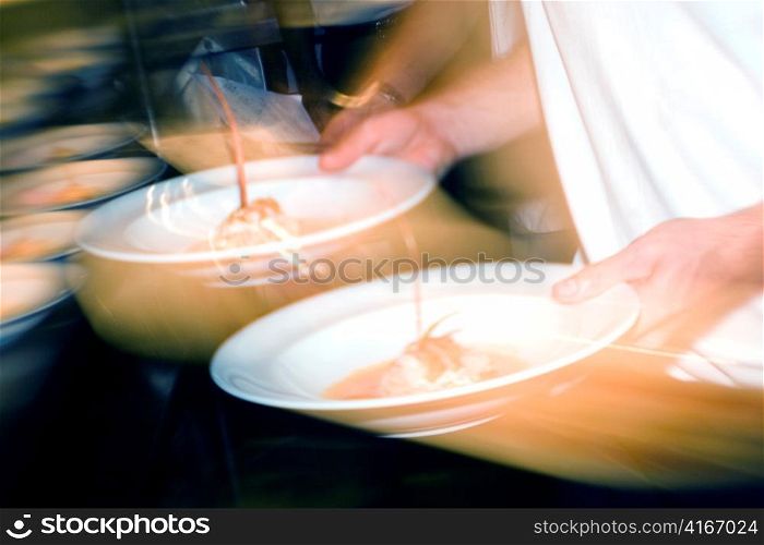 Chef Preparing Plates
