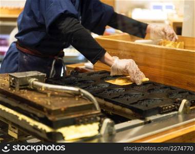 chef preparing traditional japanese food