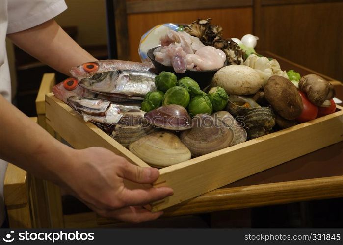 chef presenting fresh culinary recipefood ingredient fish seafood vegetable