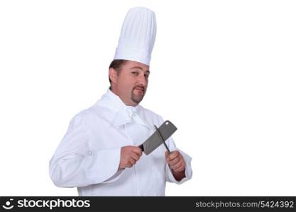 Chef sharpening a knife