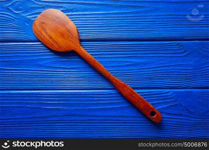 Chef tool spatula on a blue wooden background