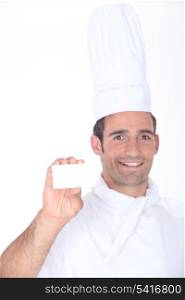 Chef with a blank business card