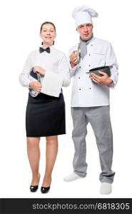 Chef with pan and waitress with a tray on a white background in full length