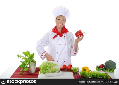 Chef with red pepper in her hand. Isolated on white background