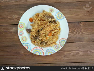 Chegdermeh - Turkmen traditional food is cooked simultaneously with rice, lamb, tomato paste