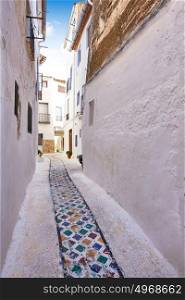 Chelva village street in Valencia of Spain Mediterranean whitewashed walls