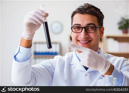 Chemical engineer working on oil samples in lab
