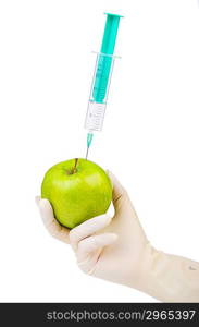 Chemical experiment with apple and syringe