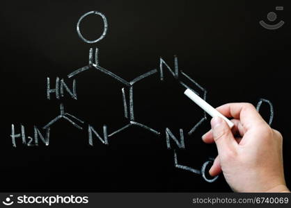 Chemical formula written in chalk on a blackboard