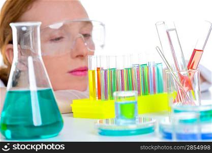 chemical laboratory scientist woman working with test tubes