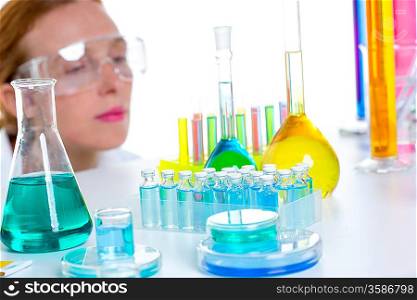 chemical laboratory scientist woman working with test tubes and flask