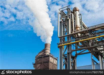 Chemical plant for the treatment of chipboard for furniture factory, with chimney