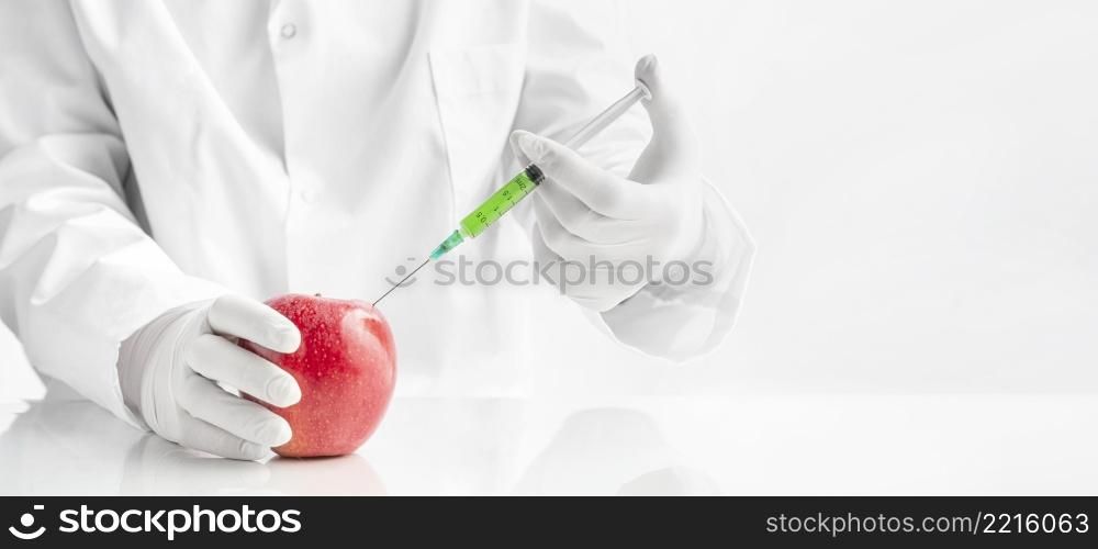 chemist injecting with toxins perfect healthy apple