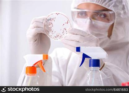 Chemist testing chemical substances in lab