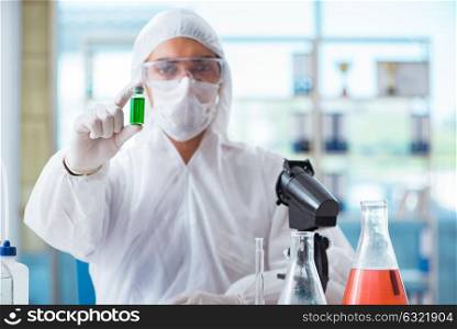 Chemist testing in the laboratory cannabis extract for medical purposes. Chemist testing in the laboratory cannabis extract for medical p