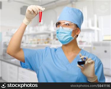 Chemist with vials at lab