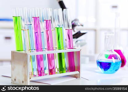 Chemistry laboratory glassware with colour liquids in them