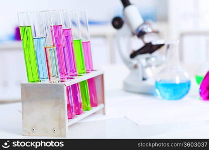 Chemistry laboratory glassware with colour liquids in them