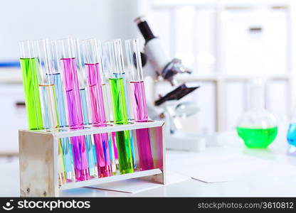 Chemistry laboratory glassware with colour liquids in them