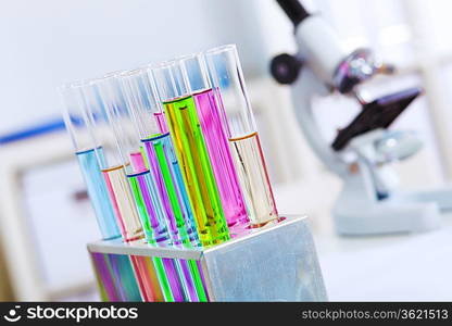 Chemistry laboratory glassware with colour liquids in them