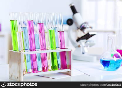 Chemistry laboratory glassware with colour liquids in them