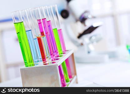 Chemistry laboratory glassware with colour liquids in them