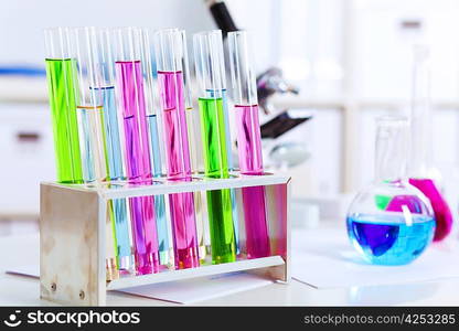 Chemistry laboratory glassware with colour liquids in them