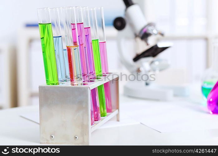 Chemistry laboratory glassware with colour liquids in them