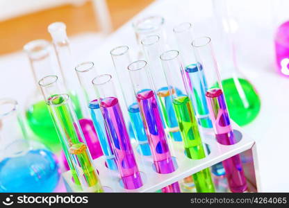 Chemistry laboratory glassware with colour liquids in them