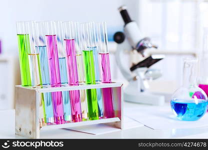 Chemistry laboratory glassware with colour liquids in them