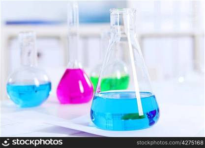 Chemistry laboratory glassware with colour liquids in them